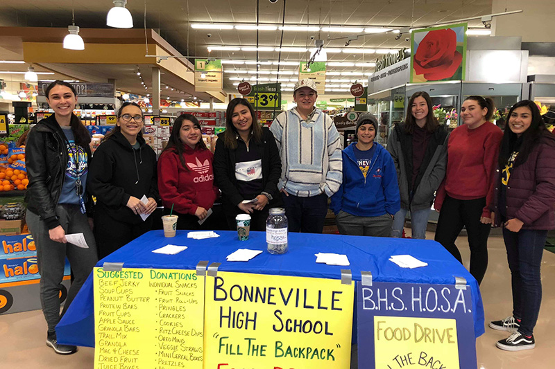 Bonneville students working at donation table