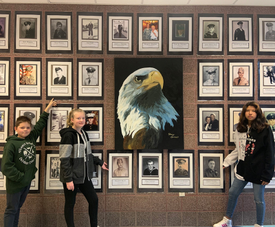 6th grade students at NOE participated in a twelve year tradition honoring veterans by filling the walls with their pictures and a brief description of their service. We love and appreciate all veterans and their service.