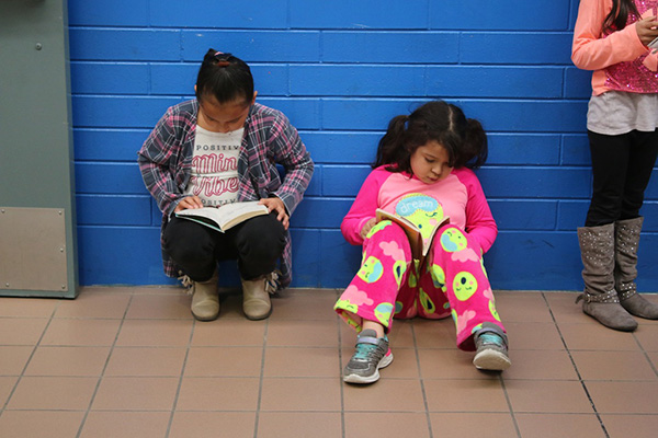 Elementary Students reading books