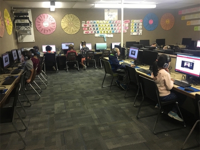 Students work on the APPL test (Chinese Immersion Test) at Uintah Elementary