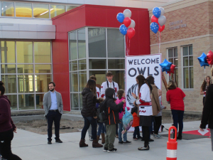 Excited students enter Orchard Springs Elementary for their big first day