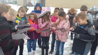 While learning about precipitation, Midland Students verify that snowflakes have six sides