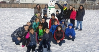 Taking a break to build snowmen at Midland Elementary!