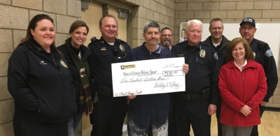 North Ogden Jr. donates money to the north ogden police department